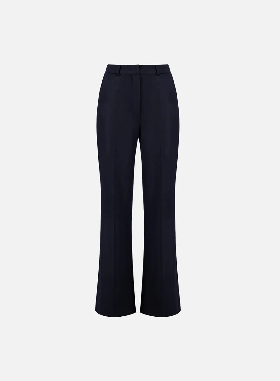 Flared fitted trousers superfine merino sold by Harris Wharf London