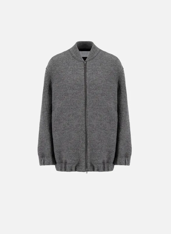 Oversized bomber in boiled wool made by Harris Wharf London