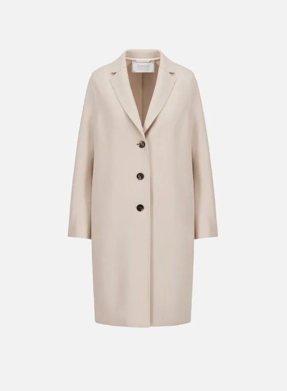 Overcoat in light pressed wool sold by Harris Wharf London