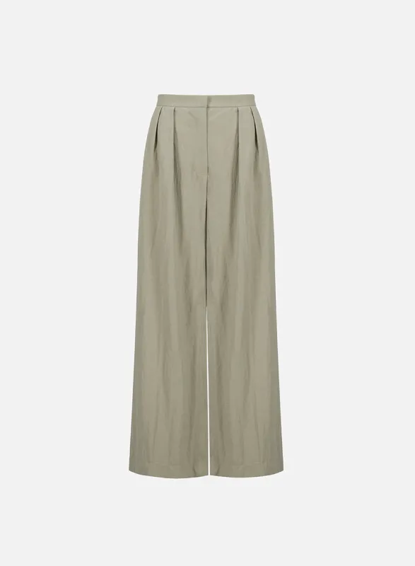 Oversized pleated trousers rayon sold by Harris Wharf London