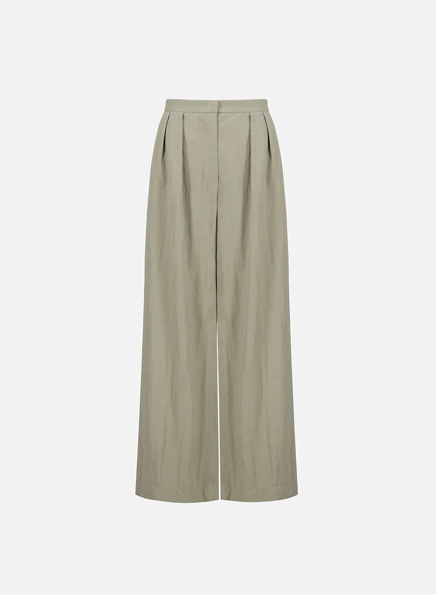 Oversized pleated trousers rayon sold by Harris Wharf London