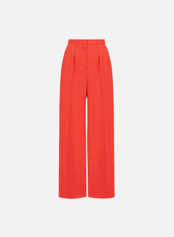 Pleated palazzo trousers techno viscose sold by Harris Wharf London
