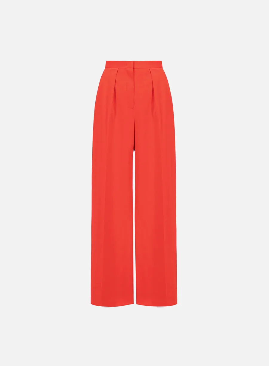 Pleated palazzo trousers techno viscose sold by Harris Wharf London