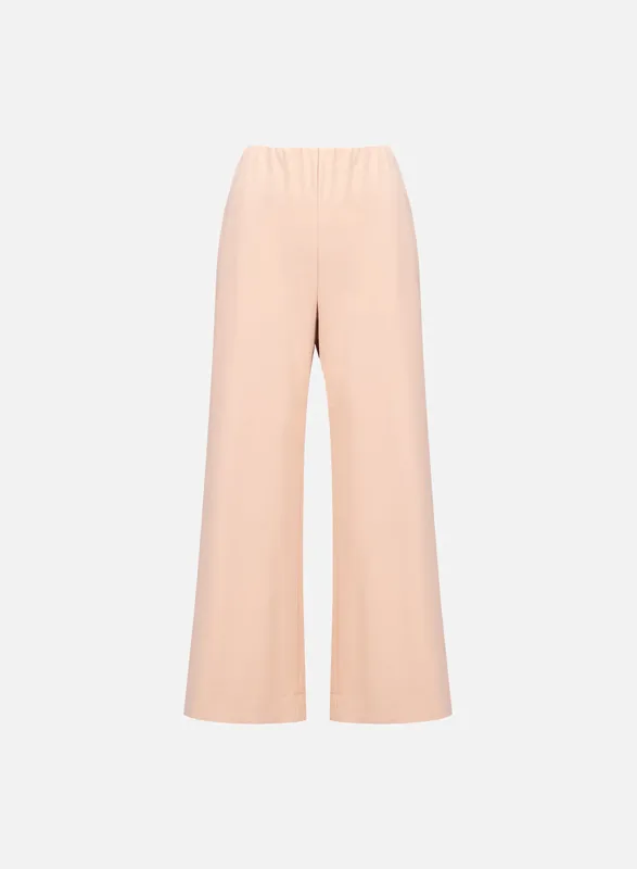 Flared trousers techno viscose sold by Harris Wharf London