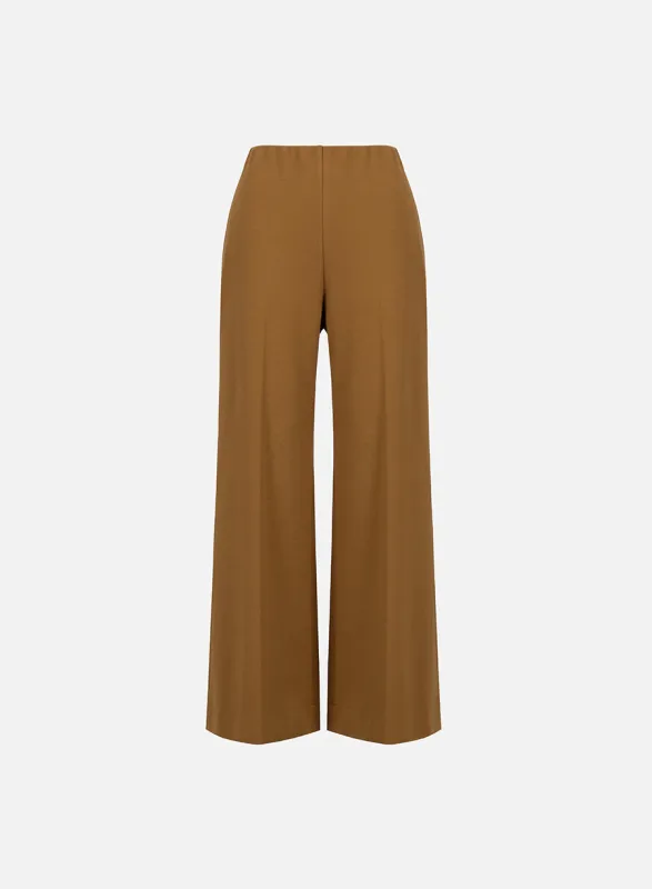 Flared trousers crafted with Loro Piana fabric sold by Harris Wharf London