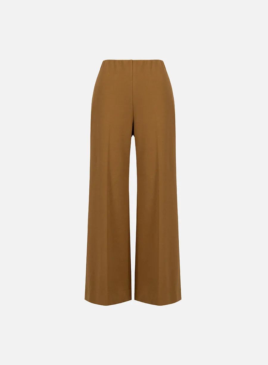 Flared trousers crafted with Loro Piana fabric sold by Harris Wharf London