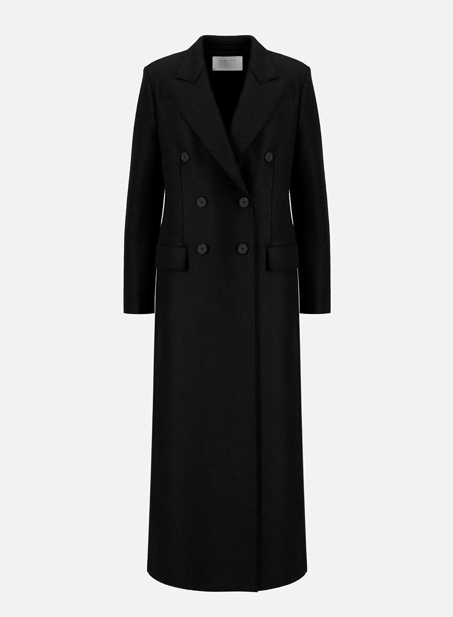 Long double breasted tailored coat in pressed wool sold by Harris Wharf London