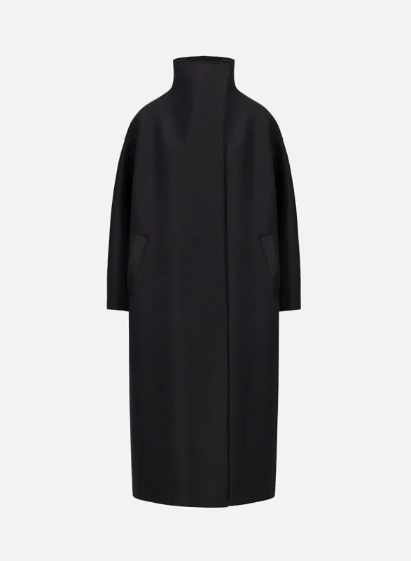 Funnel neck oversized coat in pressed wool made by Harris Wharf London