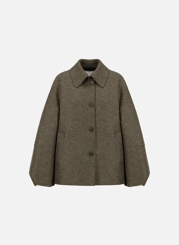 Puff sleeves jacket pressed wool made by Harris Wharf London