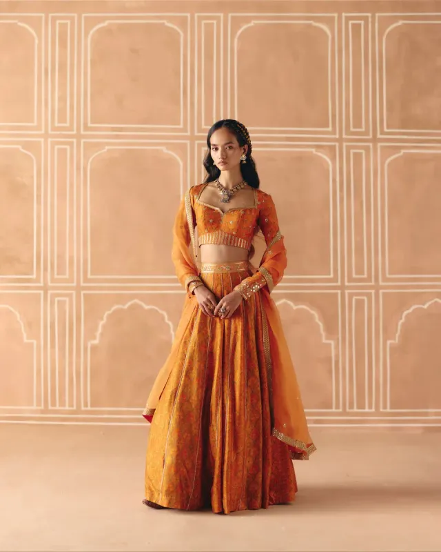Burnt Orange Mix Print Panel Lehenga sold by Market