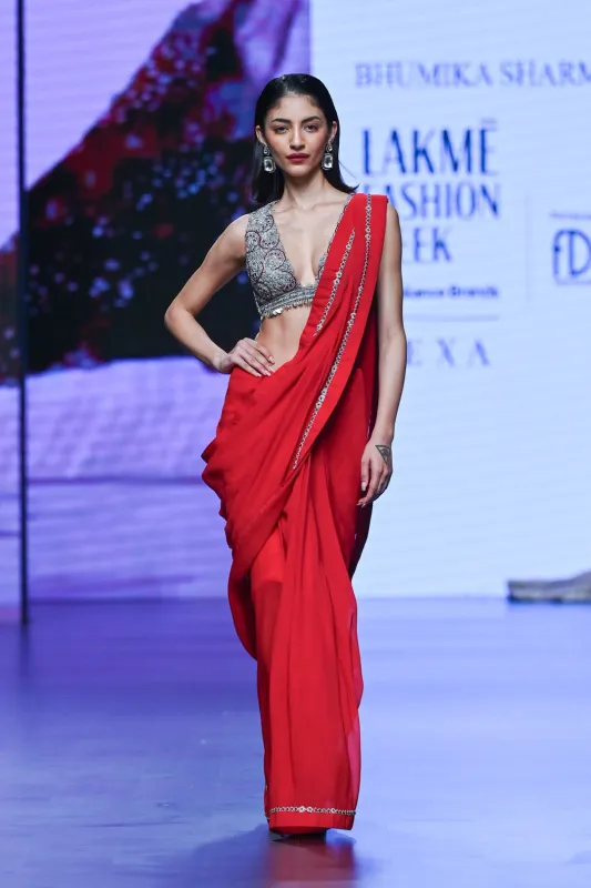 Red Embroidered Saree with Sleeveless Blouse sold by Market