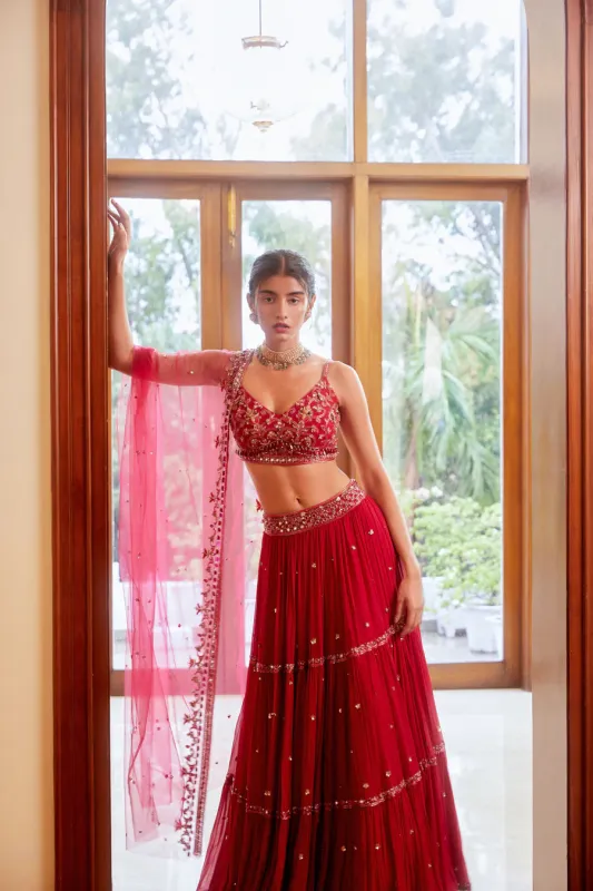 Fuchsia Three Tiered Lehenga with Blouse and Dupatta sold by Market