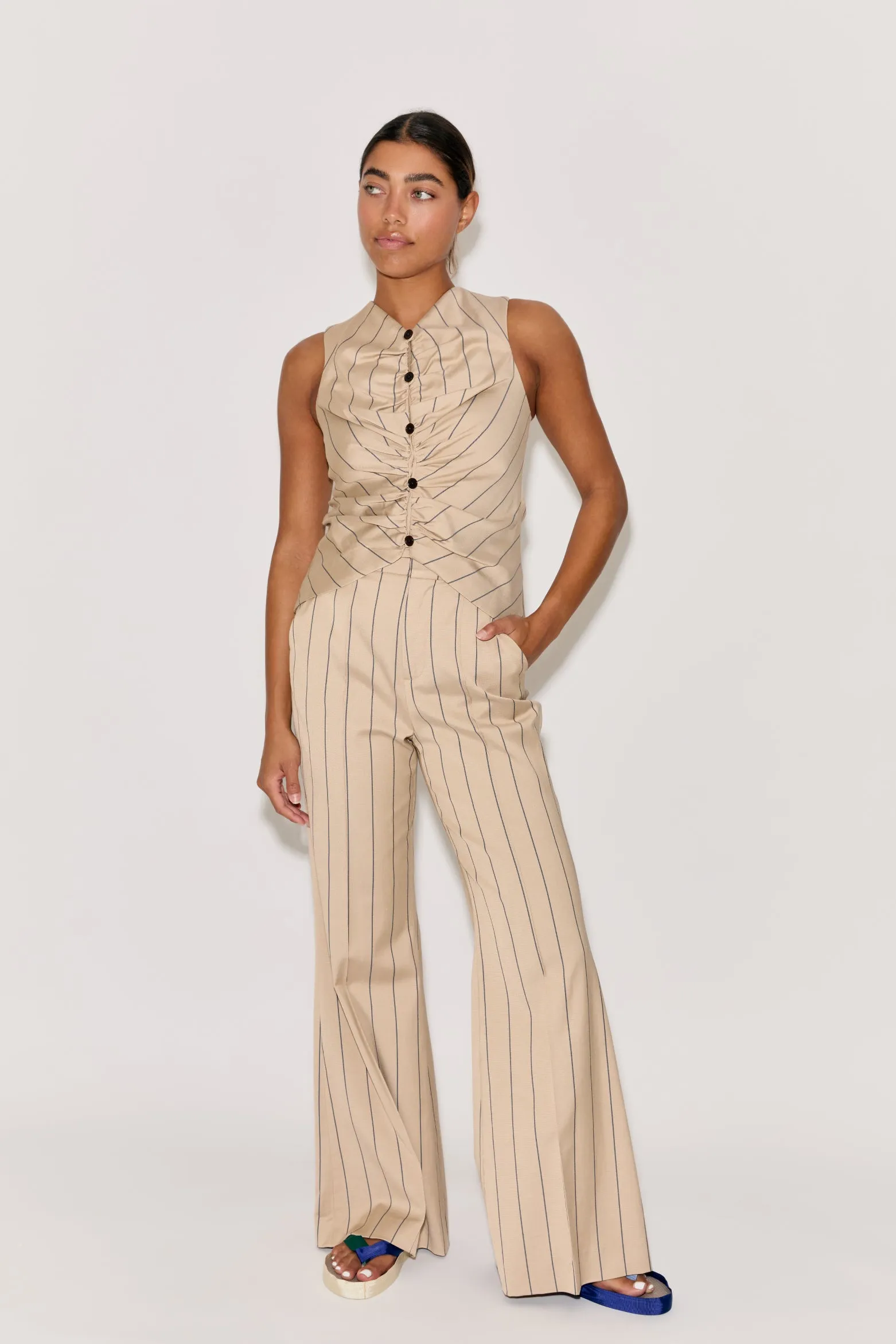 Paneled & Piped Flare Pant in Viscose Pinstripe sold by Rosie Assoulin