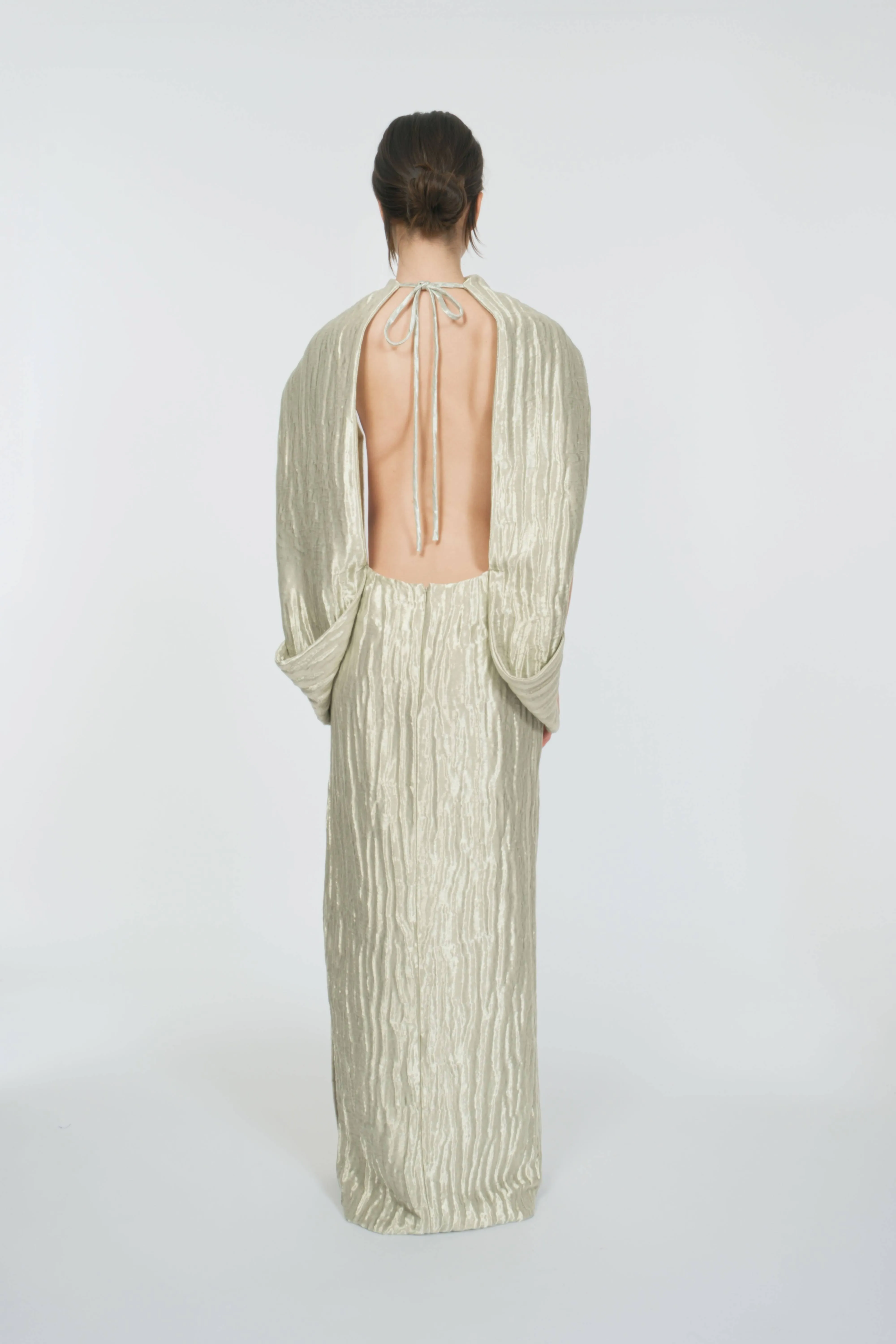 A La Mode Gown in Wavy Lame sold by Rosie Assoulin