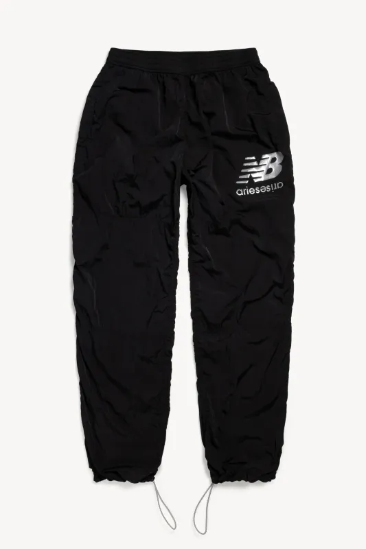 New Balance x Aries Unbalanced Windcheater Pants sold by ARIES