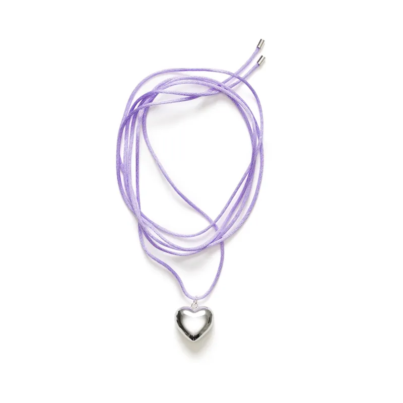 Silver Heart on a String sold by Anni Lu