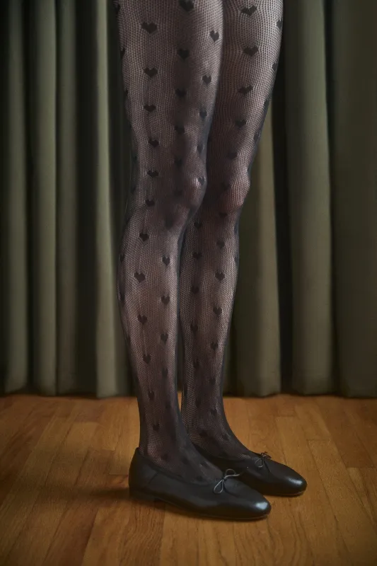 Sheer heart tights made by Petit Moments