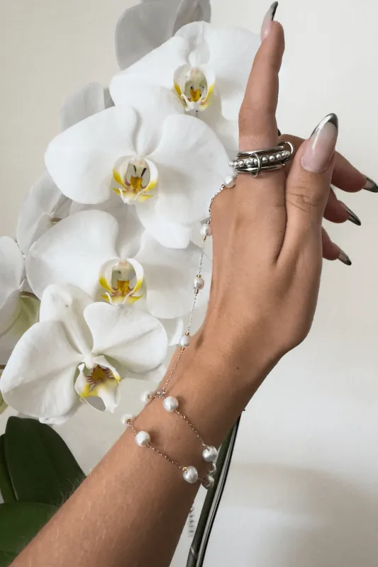 Rosa Hand Chain Bracelet sold by Petit Moments