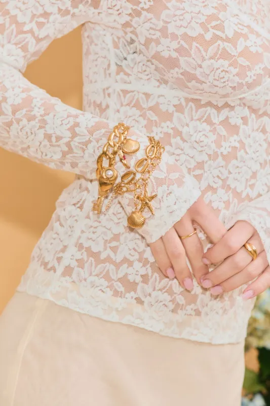 Cowrie Shell Bracelet sold by Petit Moments