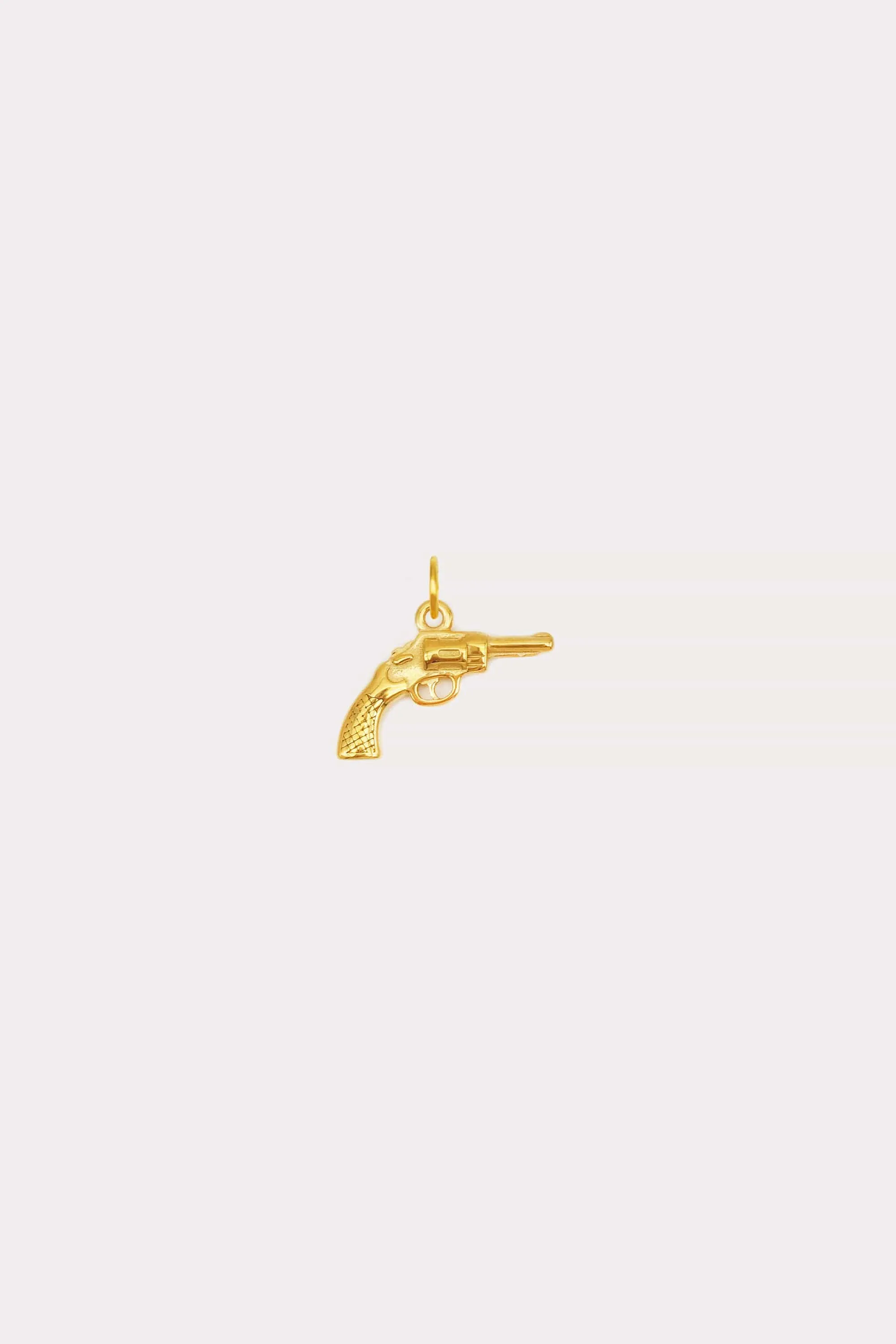 Gun Charm sold by Petit Moments