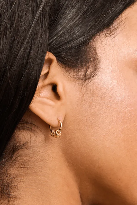 Rattle Huggie sold by Petit Moments