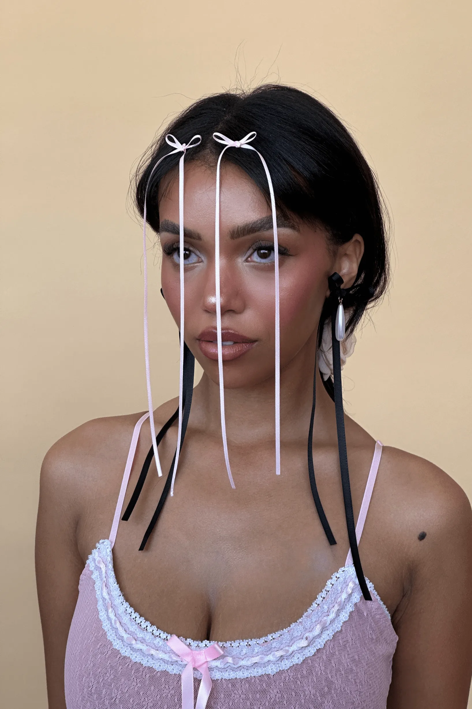 Long Bow Drop Pendant Earrings sold by Petit Moments product image thumbnail 3