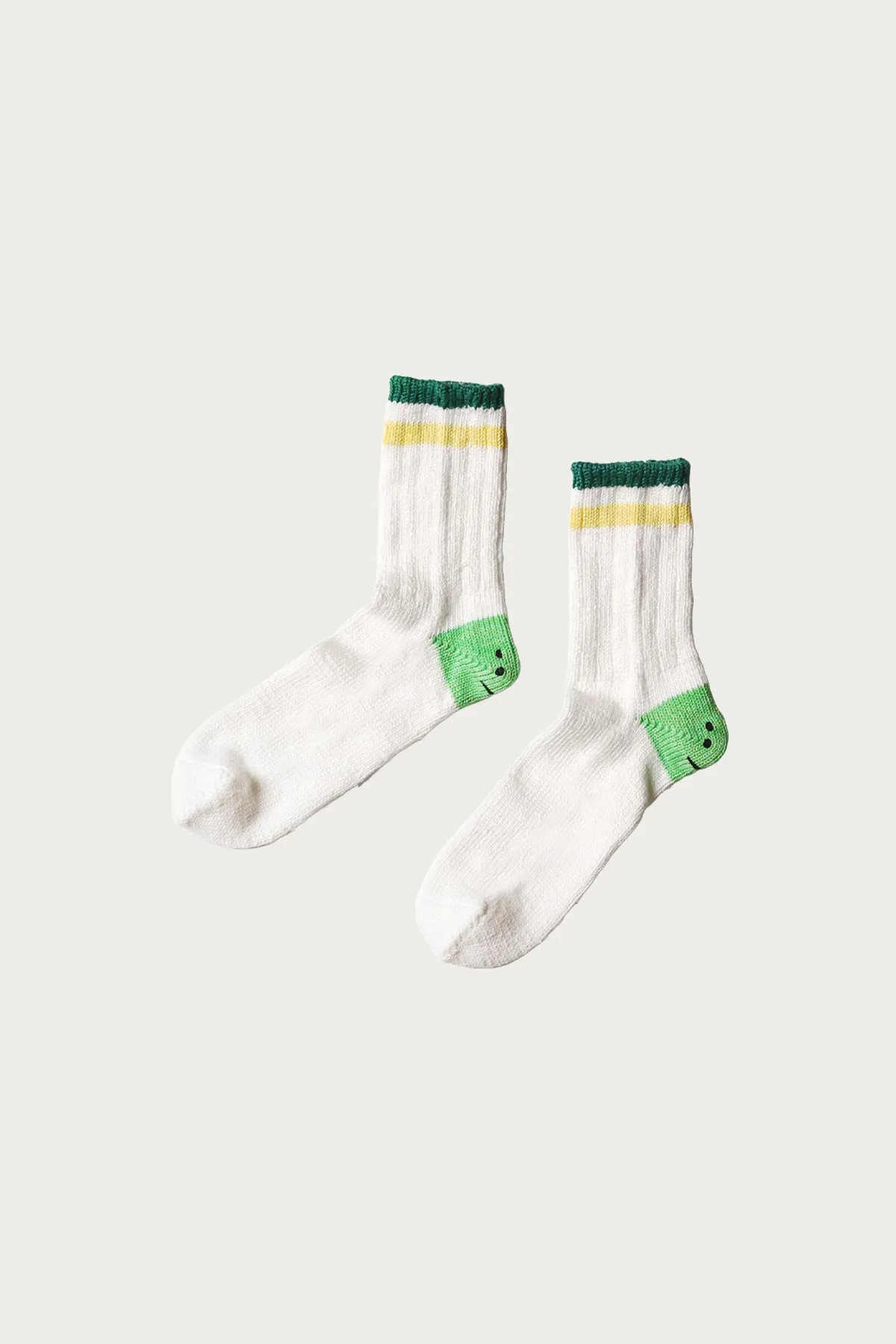 60 Yarns IVY RAINBOWY HAPPY HEEL-Hold Socks - White/Green sold by Canoe Club