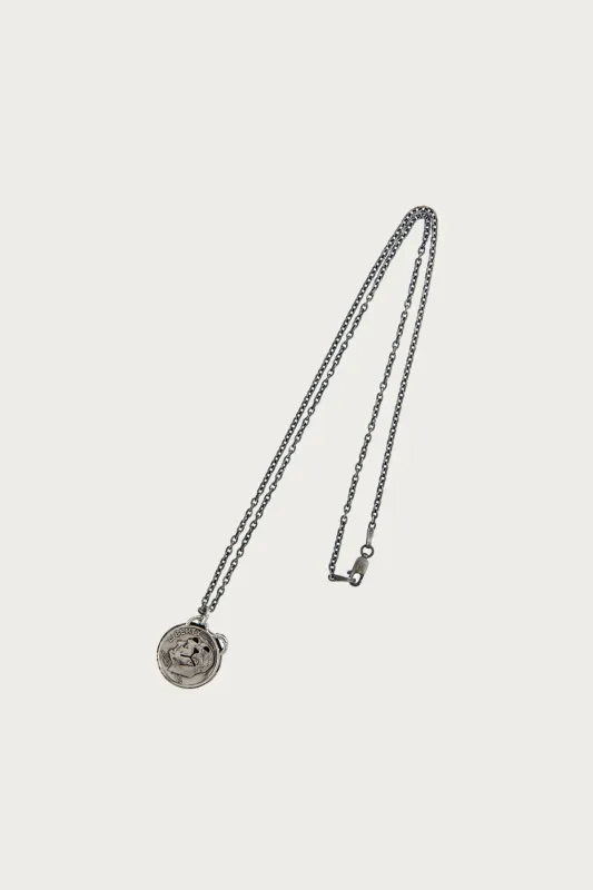 Dime/Bear Necklace sold by Canoe Club