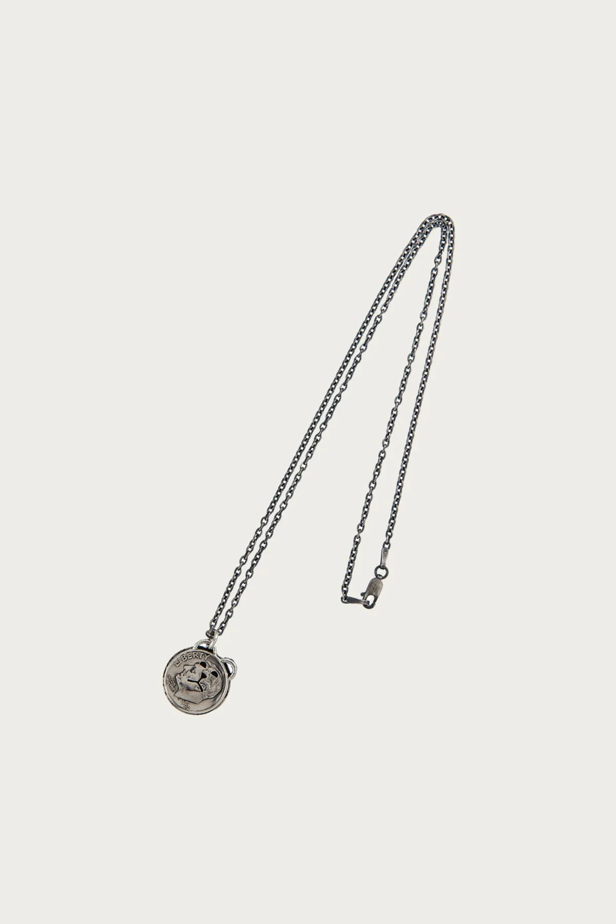 Dime/Bear Necklace sold by Canoe Club