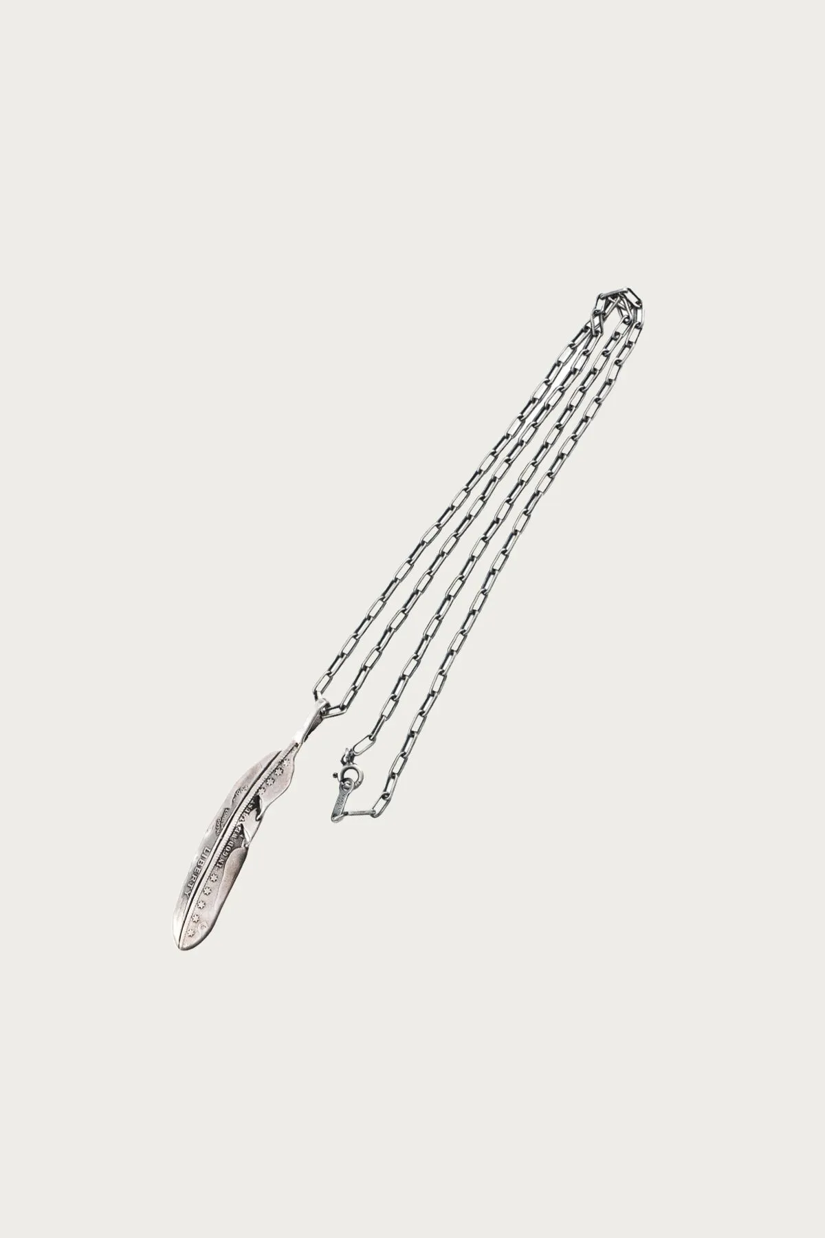 25¢ Liberty Feather Necklace sold by Canoe Club