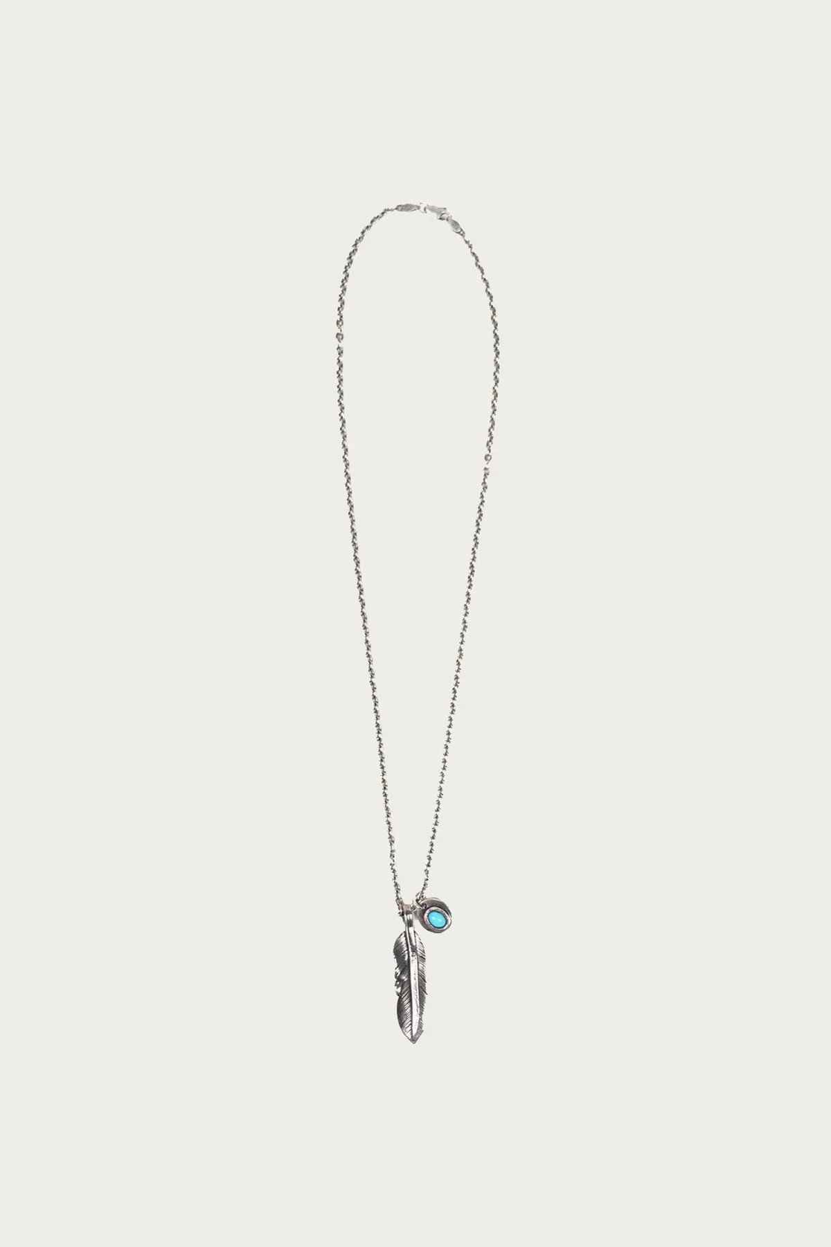Liberty Feather and Turquoise Necklace sold by Canoe Club