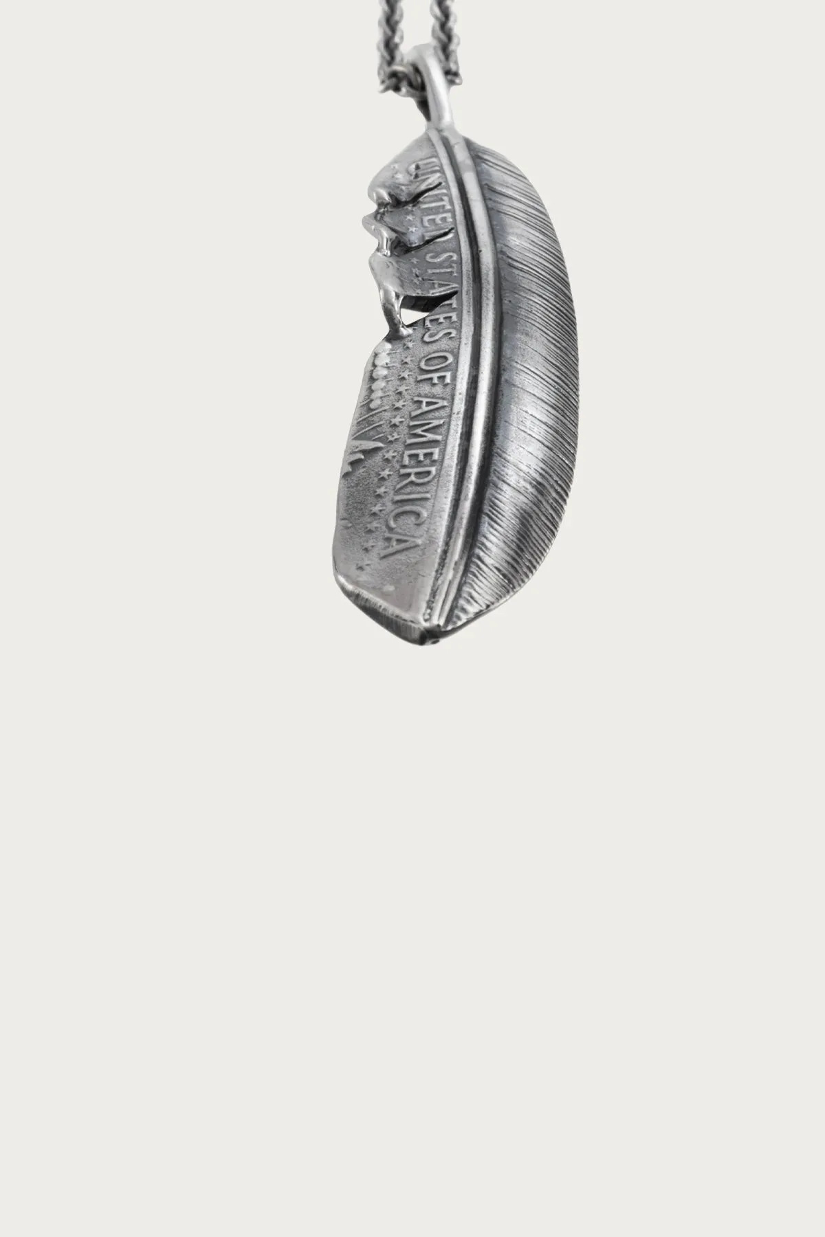 50¢ Half Feather Pendant sold by Canoe Club product image thumbnail 2