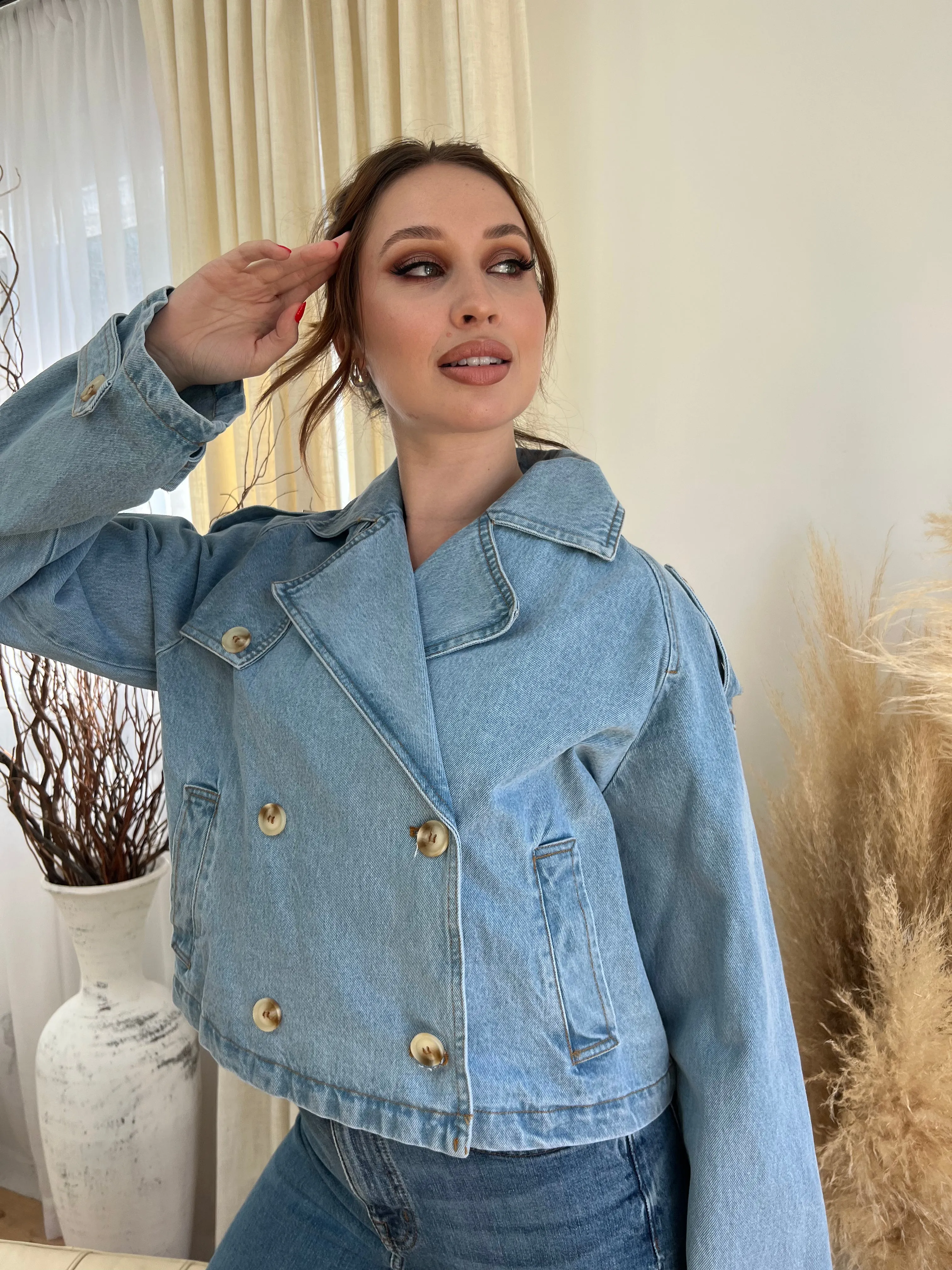 Washed denim trench cropped jacket sold by Velvet House