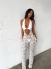 CHELSEA JUMPSUIT WHITE sold by Outcast Clothing