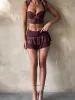 XENIA MINI SKIRT DARK MAUVE sold by Outcast Clothing
