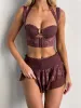 XENIA MINI SKIRT DARK MAUVE sold by Outcast Clothing