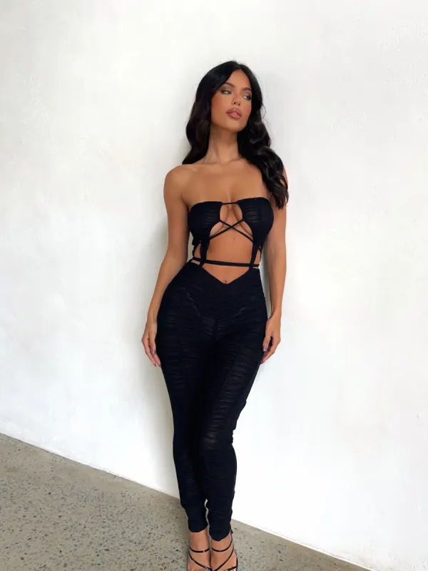VERA MESH JUMPSUIT BLACK sold by Outcast Clothing