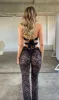 SUEDE JUMPSUIT BLACK LACE sold by Outcast Clothing