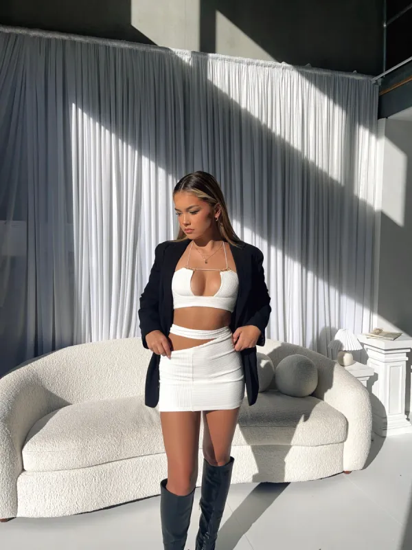 SASKIA MINI SKIRT WHITE - OUTCAST EXCLUSIVES sold by Outcast Clothing