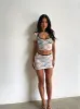 CHLOE MINI SKIRT WHITE sold by Outcast Clothing