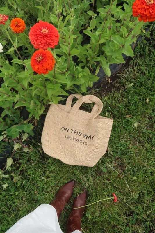 On The Way Raffia Tote sold by One Twelves