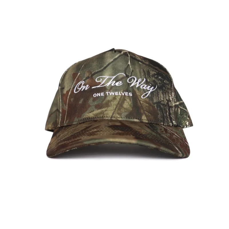 True White “On The Way” Camo Trucker Hat sold by One Twelves