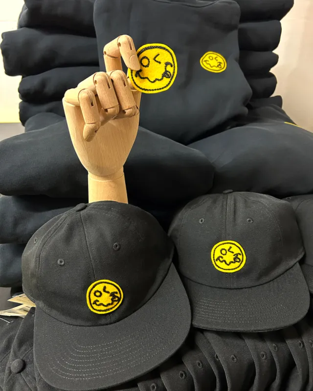 Stoned Smiley Camp Hat made by Outerknown