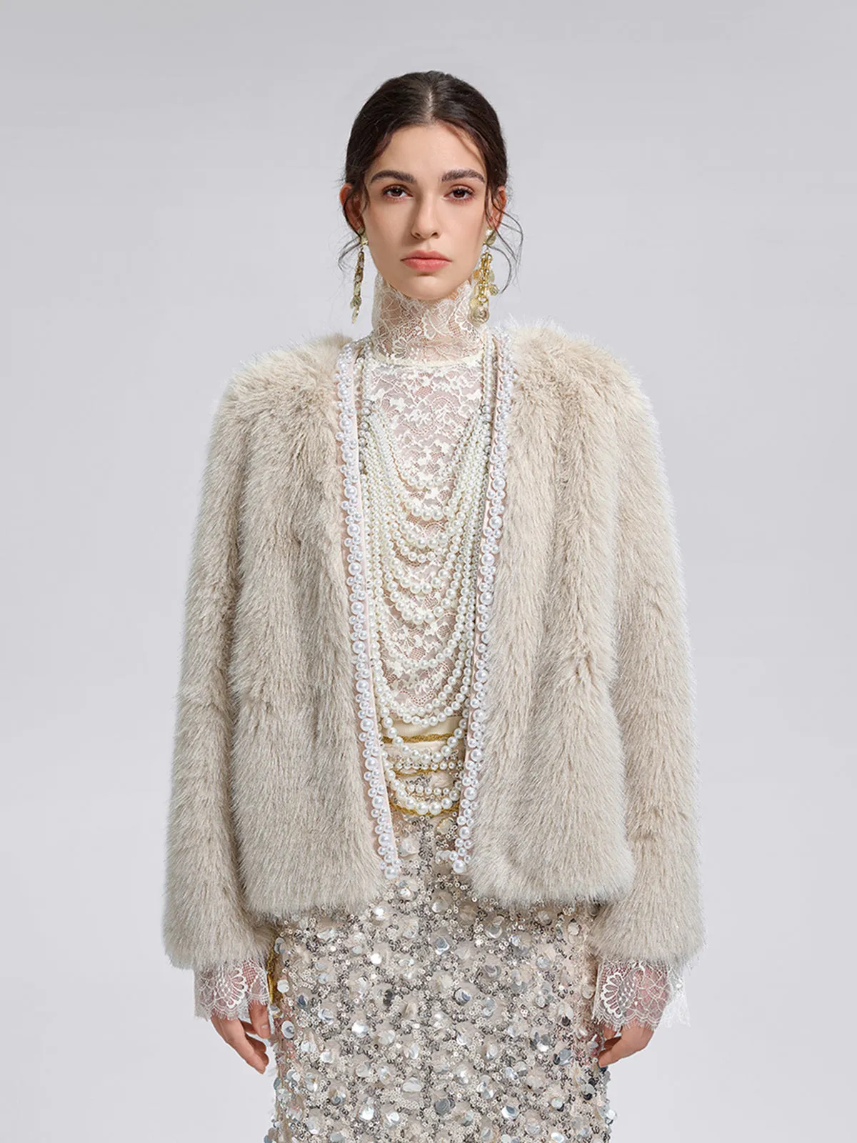 Silver-Tipped Eco Fur Pearl-Beaded Jacket sold by Rich Radi Q's