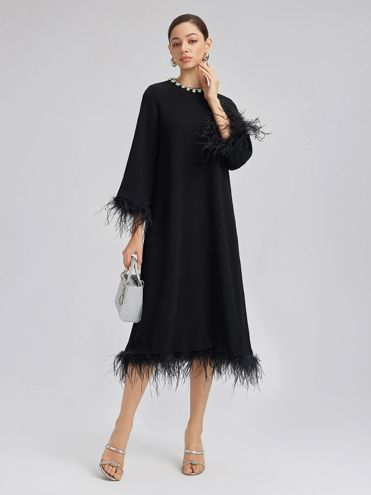 Luxurious Black Feather-Trimmed Dress sold by Rich Radi Q's product image thumbnail 3