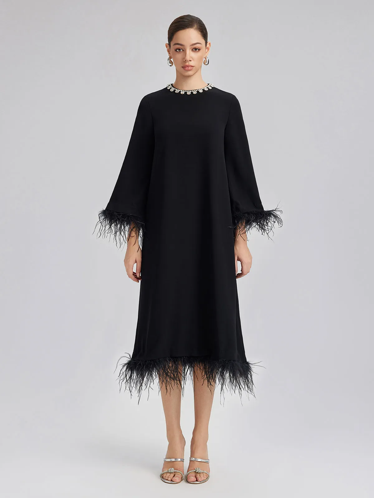 Luxurious Black Feather-Trimmed Dress sold by Rich Radi Q's