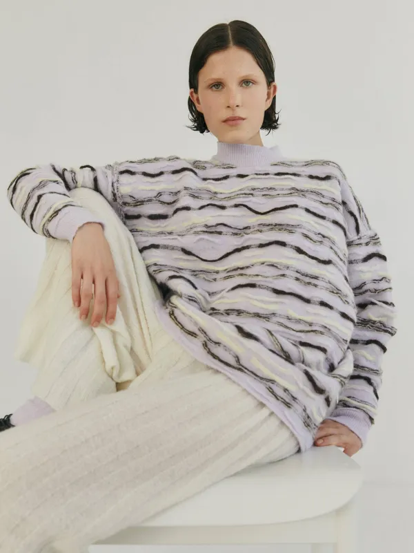 Motsure sweater sold by RUS