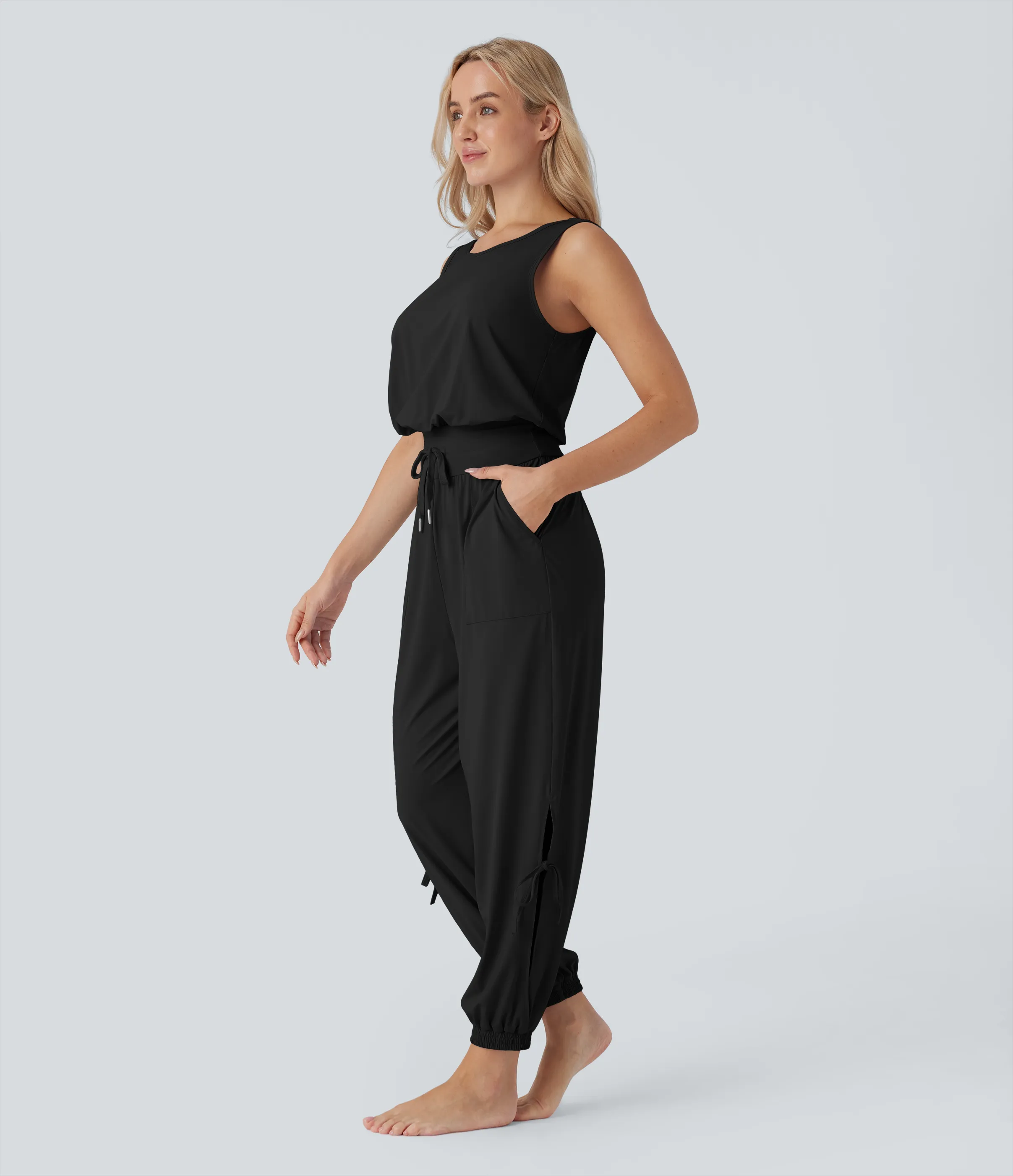 Halara Jumpsuit de yoga sin mangas con espalda descubierta, cordón ajustable y bolsillos laterales de tacto fresco - UPF50+ - Black - XS(regular) sold by Halara product image thumbnail 4