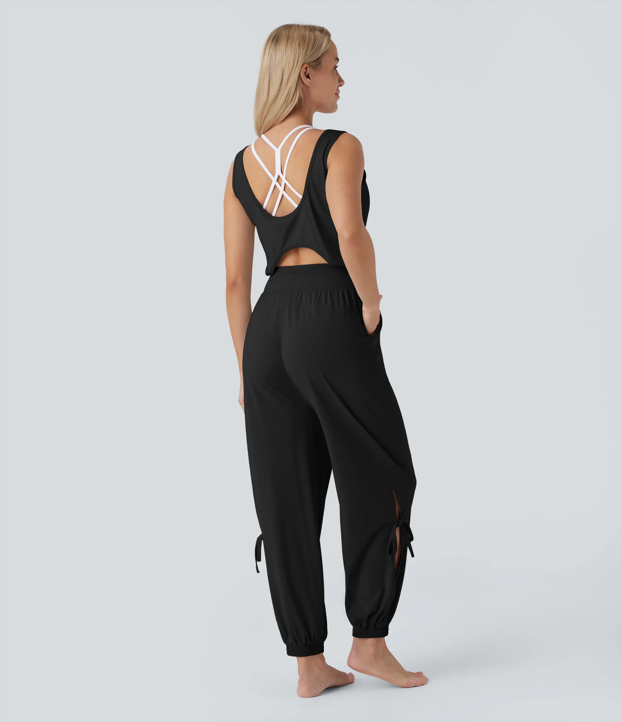 Halara Jumpsuit de yoga sin mangas con espalda descubierta, cordón ajustable y bolsillos laterales de tacto fresco - UPF50+ - Black - XL(regular) sold by Halara product image thumbnail 5
