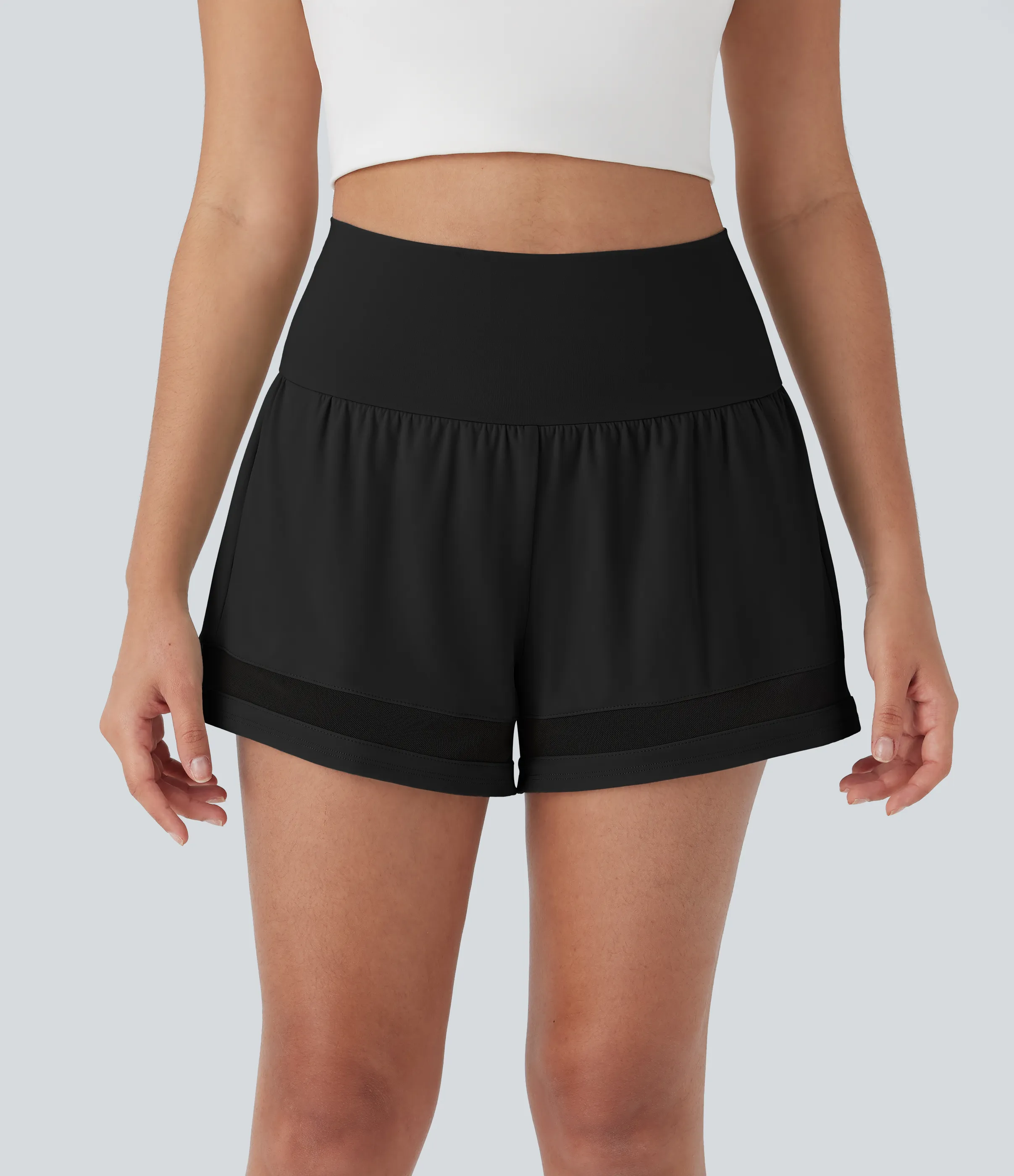 Halara Shorts de entrenamiento 2 en 1 Softlyzero™ Airy de tiro medio con contraste, bolsillos laterales y traseros de tacto fresco - Black - XS sold by Halara
